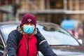 Covid-19 flu disease virus spreading in Europe. People wearing medical mask against coronavirus, influenza viruses and diseases. Royalty Free Stock Photo