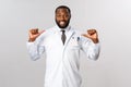 Covid19, healthcare and clinic concept. I am specialist and professional you looking for. Upbeat african-american male