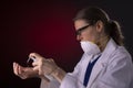 COVID-19 healthcare worker using PPE protective equipment and hand sanitizer Royalty Free Stock Photo