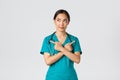 Covid-19, healthcare workers, pandemic concept. Creative and thoughtful pretty asian female nurse, intern have idea Royalty Free Stock Photo