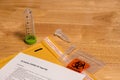 Covid19 home test kit dropper, pipette, plastic tubes, biohazard bag and envelop