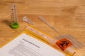 Covid19 home test kit dropper, pipette, plastic tubes, biohazard bag and envelop