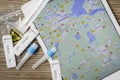Covid home testing kits laying on a table next to a map of Netherlands Royalty Free Stock Photo