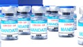 Covid mandate - vaccine bottles with an English label Mandate that symbolize a big human achievement that may end the fight with