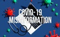 Covid-19 Misinformation theme with stethoscope and laptop