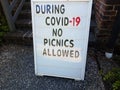 During covid 19 no picnics allowed information sign