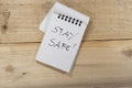 Covid-19 notes: stay safe - centered Royalty Free Stock Photo