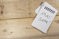 Covid-19 notes: stay safe - on right Royalty Free Stock Photo