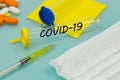 COVID-19 virus vial on a laboratory table. medicines and injections. Concept of treatment and vaccine for the virus