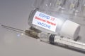 Covid-19 Omicron variant strain vaccine. Syringe and vaccine. Treatment for coronavirus covid-19 Royalty Free Stock Photo