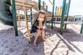 Schools closures Coronavirus lockdown. Bored school kid alone in playground feeling sad and lonely