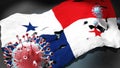 Covid in Panama - coronavirus attacking a national flag of Panama as a symbol of a fight and struggle with the virus pandemic in