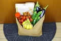 COVID-19 Pandemic Coronavirus Home delivery food grocery bag left behind door on mat for Coronavirus disease spreading safety.