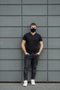 COVID-19 Pandemic Coronavirus Man in city street wearing face mask protective for spreading of Coronavirus Disease 2019 Royalty Free Stock Photo