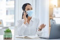 Covid, phone call and mask with a business woman at work in an office on laptop and talking on a phone. Mobile Royalty Free Stock Photo