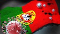 Covid in Portugal - coronavirus attacking a national flag of Portugal as a symbol of a fight and struggle with the virus pandemic Royalty Free Stock Photo