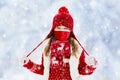 Child playing in snow on Christmas. Kids in winter Royalty Free Stock Photo