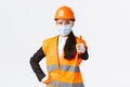 Covid-19 safety protocol at enterpise, construction and preventing virus concept. Confident asian female engineer