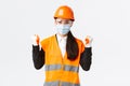 Covid-19 safety protocol at enterpise, construction and preventing virus concept. Successful winning female asian