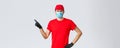 Covid-19, self-quarantine, online shopping and shipping concept. Displeased angry delivery guy scolding courier making Royalty Free Stock Photo