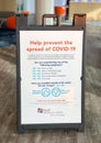 Covid sign stand used in banking to ensure safety and protection of clients at G & F Financial Group