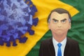 Santo AndrÃÂ©/SÃÂ£o Paulo/Brazil - April 11, 2020 - President Jair Bolsonaro. The brazilian flag behind him has a blue conronavirus