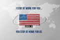 Covid-19. Surgical mask with the United States flag showing the message `stay at home Royalty Free Stock Photo