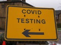 Covid testing medical center sign with arrow Royalty Free Stock Photo