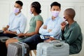 Covid, travel and compliance, men and women at airport with mask waiting for an airplane. Safety, security and diversity Royalty Free Stock Photo