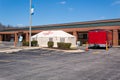 COVID-19 triage tent set up in parking lot of small rural hospital. Rural hospitals like this one 42 beds will be hard pressed t Royalty Free Stock Photo