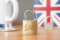 Covid-19 UK lockdown concept. A lock with the message