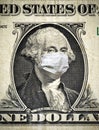 COVID-19 in USA, President Washington with face mask on dollar money note. Coronavirus affects global stock market Royalty Free Stock Photo