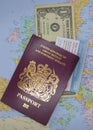 Covid 19 Vaccination card,  UK Passport and Dollar bill Royalty Free Stock Photo