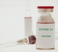 covid-19 vaccine bottle with seringue Royalty Free Stock Photo