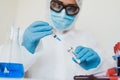 COVID vaccine. Competent medical worker spending his work time in the laboratory while researching coronavirus disease