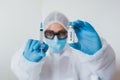 COVID vaccine. Competent medical worker spending his work time in the laboratory while researching coronavirus disease