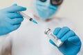 COVID vaccine. Competent medical worker spending his work time in the laboratory while researching coronavirus disease