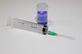 Corronavirus vaccination dose ready for immunisation. Hypodermic needle and covid-19 vaccine in a small glass vial Royalty Free Stock Photo