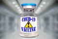 COVID-19 vaccine precautions, fake; hospital background