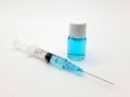 Covid-19 vaccine in syringe and vial