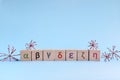 Covid-19 virus variants concept. Wooden blocks with greek letters representing coronavirus mutation.