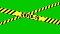 COVID-19 warning Black and Yellow ribbon on isolated green background, Coronavirus danger area, Police cordon to forbid