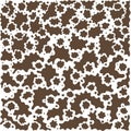Cow brown spots on a white background, the color of the skin. Print on fabric, Wallpaper, and covers. 2021.