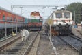 Cow and Loco Engines on Indian Railway tracks Royalty Free Stock Photo