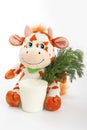 Cow with milk and greenery. Royalty Free Stock Photo