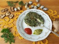 Cow parsley omelet on plate, Cooking with ginger, wild plants, Cow parsley and goutweed