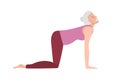 Cow Pose. Senior woman doing yoga. Woman in sportswear doing floor exercises on floor. Elderly Women healthy lifestyle