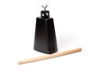 Cowbell percussion musical instrument, black metal with a wooden stick