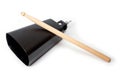 Cowbell percussion musical instrument, black metal with a wooden stick Royalty Free Stock Photo