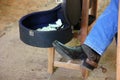 Cowboy boot of country singer accept donation for his life Royalty Free Stock Photo